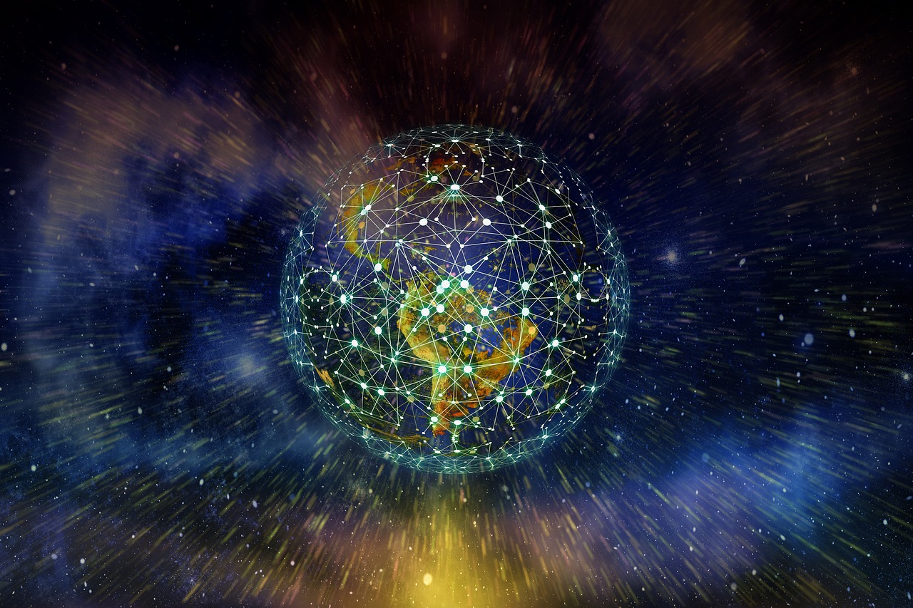 Photo of earth, set in space, covered in lines and dots to represent how the whole world is connected by technology.